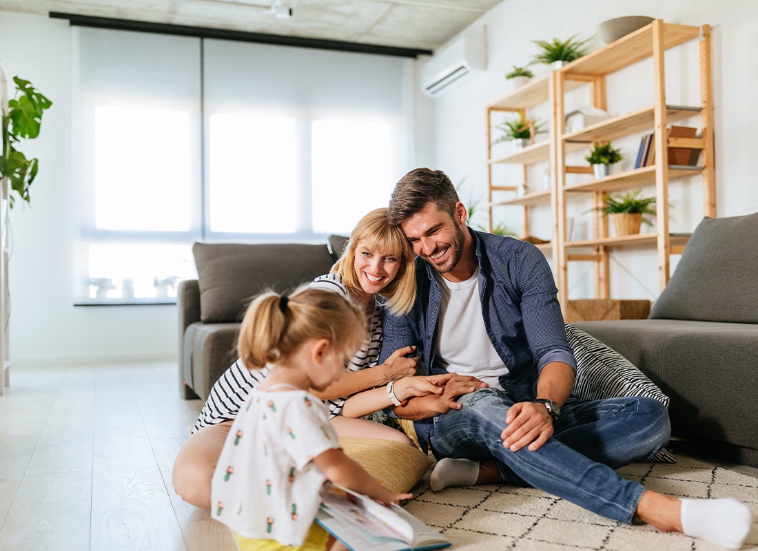 Personal Insurance - Family Spending Time Together in Their Living Room on the Weekend